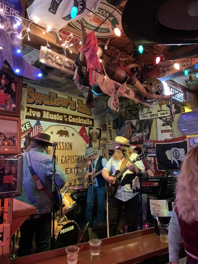 Band performing at Swallows Inn